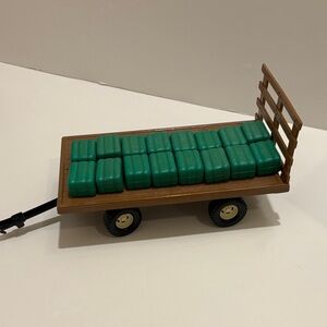 Ertl 5674 John Deere hay wagon with original packaging.